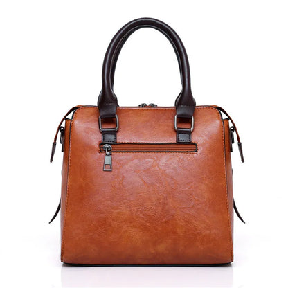 Premium-Set aus Echtleder - Tasche + Geldbörse + Clutch + Necessaire gratis