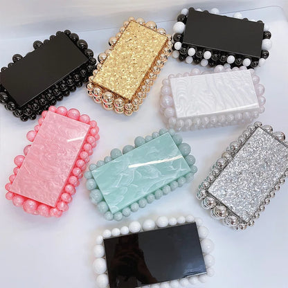 Clutch-Tasche aus Acryl in Marmoroptik