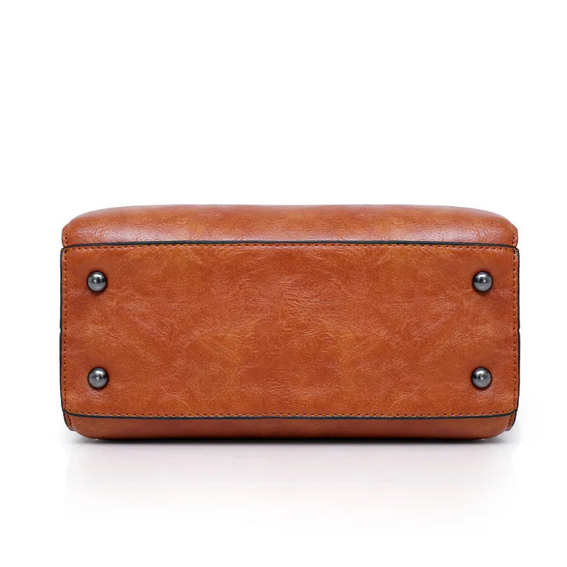 Premium-Set aus Echtleder - Tasche + Geldbörse + Clutch + Necessaire gratis