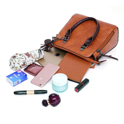 Premium-Set aus Echtleder - Tasche + Geldbörse + Clutch + Necessaire gratis