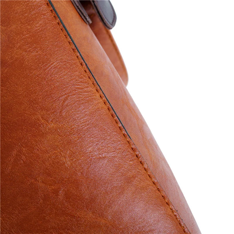 Premium-Set aus Echtleder - Tasche + Geldbörse + Clutch + Necessaire gratis