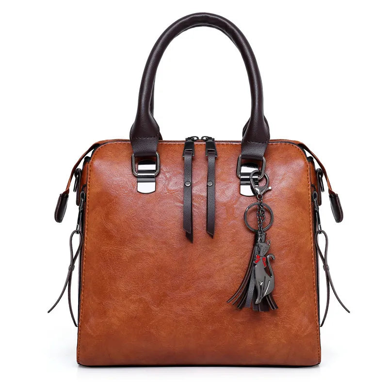 Premium-Set aus Echtleder - Tasche + Geldbörse + Clutch + Necessaire gratis